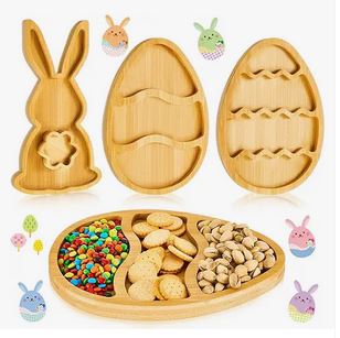 Three piece wooden food serving platters. One is a bunny and the other two are egg shaped