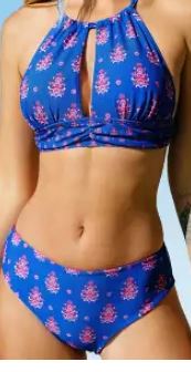 Womens bikini set in blue with print. Bottoms of suit are reversible and turns into a maroon color. 