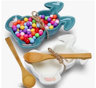 Two Piece Bunny Candy Dishes. One bowl is blue and the other is white. Both come with a spoon to scoop out candy 