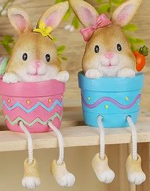 A set of two resin pot bunnies that can sit on a shelf and have their legs dangle.