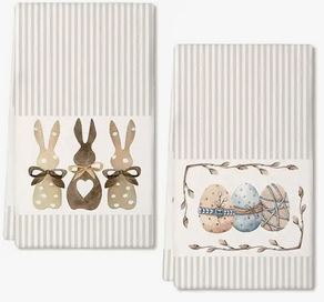 A set of two kitchen or bath towels. One towel has three bunnies and the other towel has three easter eggs 