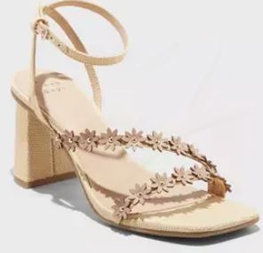 Chunky wedge cream colored sandal with flower details
