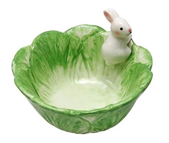 Lettuce themed serving bowl with a bunny figurine climbing on the outside