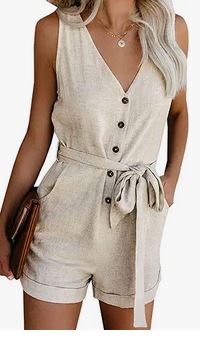 Beige romper with v-neck design, buttons, a belt and cuffed shorts